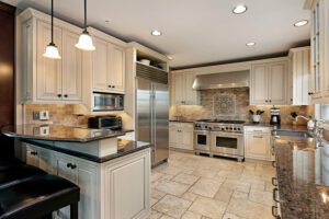 Kitchen remodel in Woodland Park with bar seating and custom kitchen cabinets