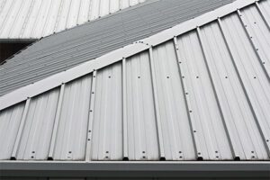 Silver Metal Roof installation in Pueblo, CO