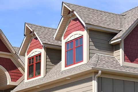 Red Home with Residential Roofing in Pueblo