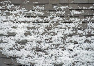 Snow and Hail Buildup on a Roof Causing Roof Hail Damage in Pueblo, CO